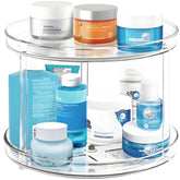 Adoco 2-tier lazy susan bathroom organizer turntable for easy access to toiletries.