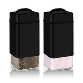 Aelga black salt and pepper shaker front view with sleek stainless steel lid for table use.