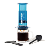 AeroPress Clear Blue Coffee Press clear chamber for visible brewing and flavor control.