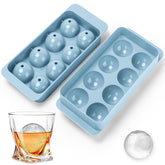 Aibirui round ice cube mold creates eight smooth whiskey ice balls.