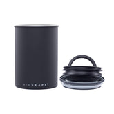 AirScape coffee canister with inner plunger lid removes oxygen to preserve freshness.