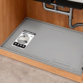Aisslro under-sink mat waterproof surface protects cabinets from spills and leaks.