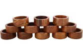 Ajuny napkin rings set of 12 in natural wood enhances elegant table settings.