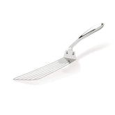 All-Clad slotted turner head drains grease while flipping foods.