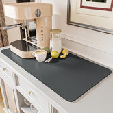 AMOAMI coffee mat hide-stain rubber-backed on kitchen counter protects against spills.