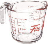 Anchor Hocking Fire-King 16 oz measuring cup with readable red measurements for precision cooking