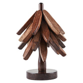 Anfrere tree-shaped trivet set with four trivets and stand protects surfaces from hot pots.