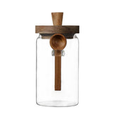 ANSQU 34oz glass jar with wooden lid offers clear visibility of contents.