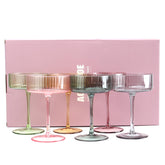 AOROTOE champagne coupe glasses, ribbed pink and yellow, perfect for vibrant entertaining.