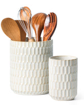 ArteBake large beige utensil holder on counter keeps spatulas within reach.