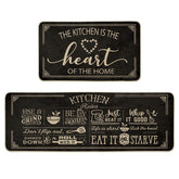 Artoid Mode black kitchen mats with seasonal pattern, 17x29, adds stylish floor protection.
