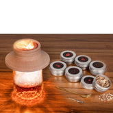 ArwySciI premium cocktail smoker kit used on a rocks glass for a refined ritual