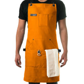 Asaya Chef BBQ apron with bottle opener, ready for outdoor grilling.
