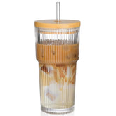 AUFXKOO 20oz ribbed glass cup with bamboo lid, ideal for stylish sipping.