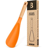 Badiano cooking spoon with orange wood handle, comfortable grip for stirring.