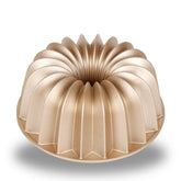 Baker's Secret fluted cake pan assembly with sturdy build and even heat.