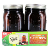 Ball wide-mouth amber quart jar four-pack preserves freshness.
