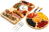 Bambusi charcuterie board with a large cheese board offers ample serving space for meats.