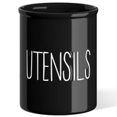 Barnyard Designs ceramic farmhouse utensil holder on countertop keeps utensils organized.