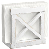 Barnyard Designs farmhouse napkin holder on table adds rustic charm and easy napkin access.