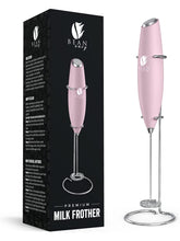 Bean Envy Milk Frother pink stand shown for easy storage and quick frothing at home.