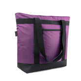 BeeGreen Cooler Bag open on the beach keeps drinks cool and snacks fresh.