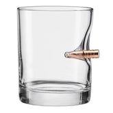 BenShot rocks glass with real .308 bullet closeup showing embedded design.