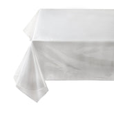 Benson Mills heavy-duty crystal-clear tablecloth protects surfaces while showcasing wood grain.