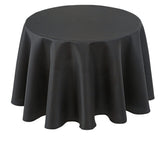 Biscaynebay round tablecloth on table elevates dining aesthetics with a sleek black finish.