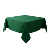 Biscaynebay textured tablecloth in hunter green enhances square-table elegance