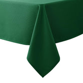 Biscaynebay textured tablecloth in hunter green offers durable, water-resistant protection for festive meals.