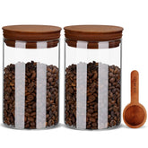 Boilmerit 27oz coffee canister set on a counter with glass jars and wooden lids for organized storage