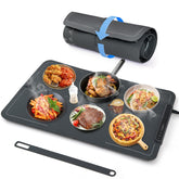 Bomova warming mat in use on a countertop buffet, keeping multiple dishes warm for guests.
