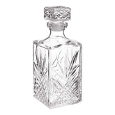 Bormioli Rocco Selecta decanter with starburst detailing enhancing light reflections.