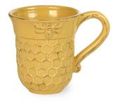 Boston International embossed ceramic mug with honeycomb pattern and bee, microwave safe.
