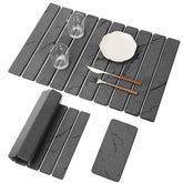Bunmery large stone drying mat in dark gray marble showing high absorbency.