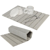 Bunmery stone drying mat laid flat on counter, showing quick-dry 24x16 size.