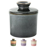 Butter crock with lid on countertop shows elegant ceramic design for fresh spreads.