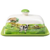 CADVJXZ cow butter dish with lid featuring embossed pattern on rustic kitchen counter