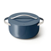Caraway Dutch Oven 6.5qt navy with lid on, durable and stylish.