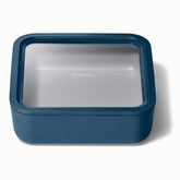 Caraway glass storage 10-cup container with airtight seal preserves leftovers.