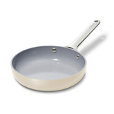 Caraway mini fry pan cream on stovetop for quick single-serve meals.