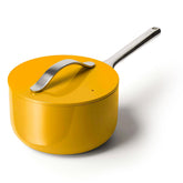 Caraway 3 qt sauce pan with marigold lid on for effortless nonstick cooking.
