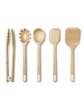Caraway wooden spoon for gentle stirring on nonstick cookware.