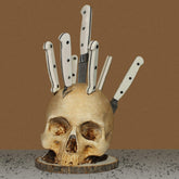 CAREEN skull knife holder keeps knives accessible with spooky kitchen decor.