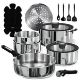 CAROTE 18pcs detachable-handle cookware on stove for quick removal and storage.