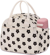 Carry bloom lunch box with corduroy front pocket for easy cutlery transport at work.