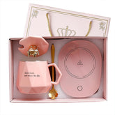 CGHWBEA coffee warmer on pink desk keeps drinks at 55°C for a comfortable sip
