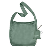 ChicoBag Sling rePETe Refine sage bag folded in built-in pouch for compact storage
