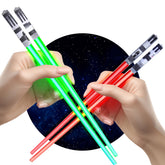 ChopSabers green LED lightup chopsticks illuminate sushi nights with playful flair.